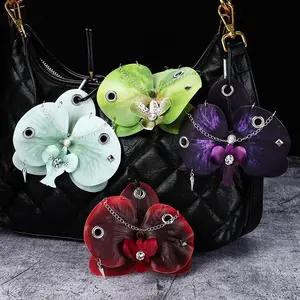 [NEW] Elegant Orchid Keychain – Realistic Moth Orchid Flower Charm for Handbags, Unique Floral Accessory