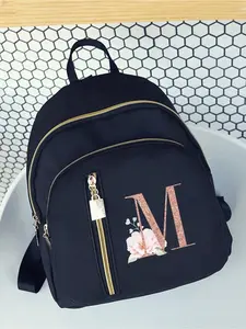 This stylish nylon women's backpack features a rose gold floral A-Z letter pattern design, multifunctional fashion design, zipper closure, large capacity, and multiple pockets. Suitable for girls and young women.