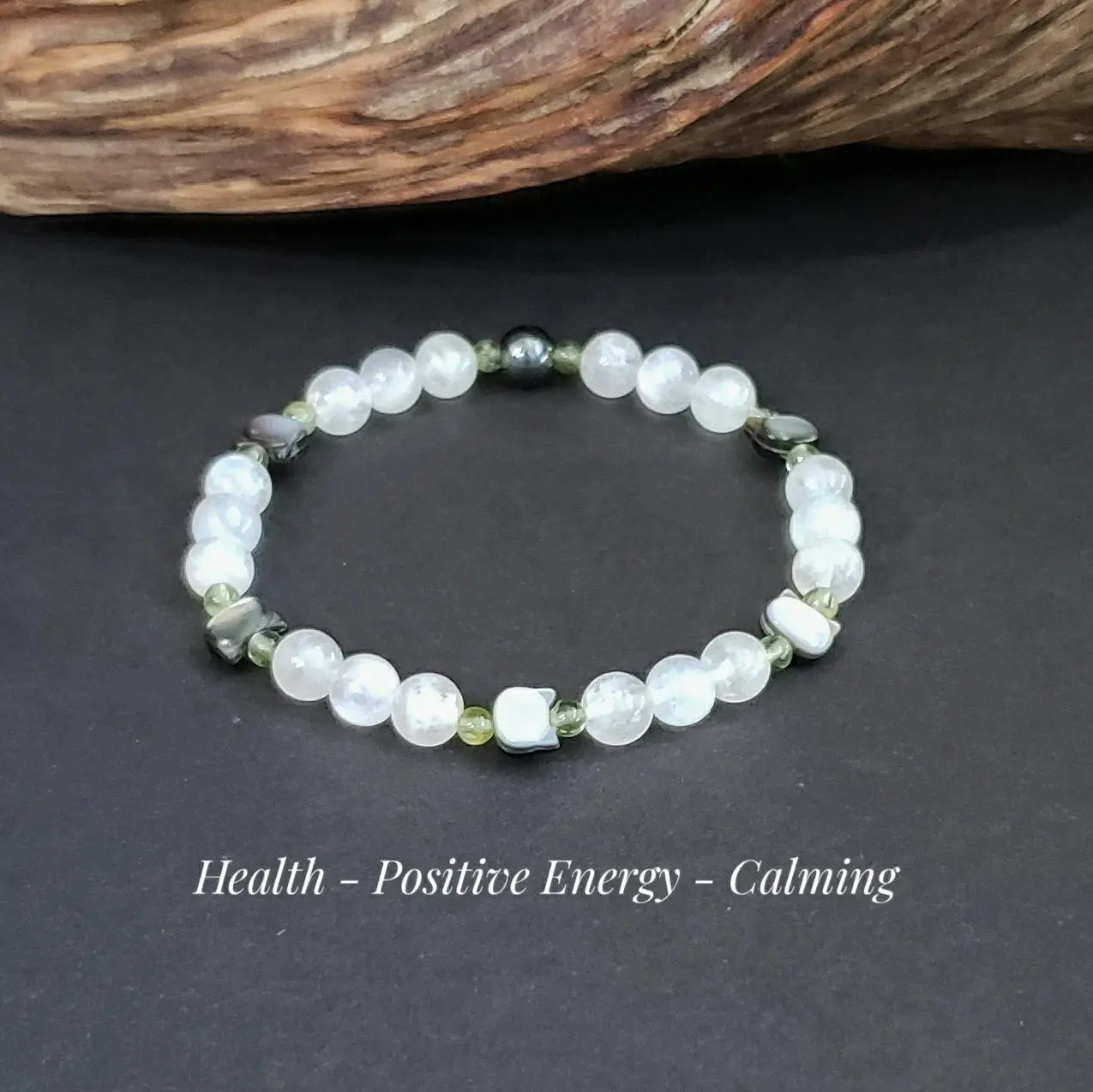 Moonstone and Peridot Beaded Crystal Bracelet with Carved Black Mother of Pearl Cats - Unique and Whimsical Jewelry