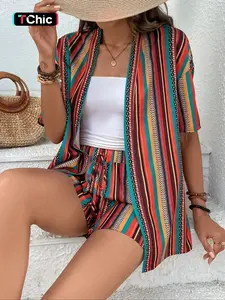 A two-piece set featuring a multi-colored bohemian print short-sleeved shirt and tie-down shorts, perfect for vacations and everyday wear, featuring a trendy beach style.