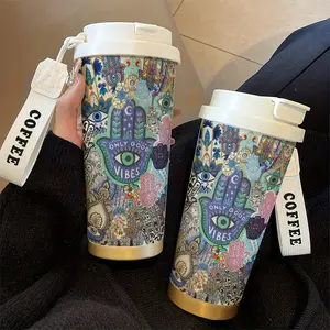 An 18oz Magic Eye Design Thermos Cup, stylish and modern, suitable for both hot and cold beverages. This portable stainless steel thermos cup is perfect for the office, home, and fitness activities