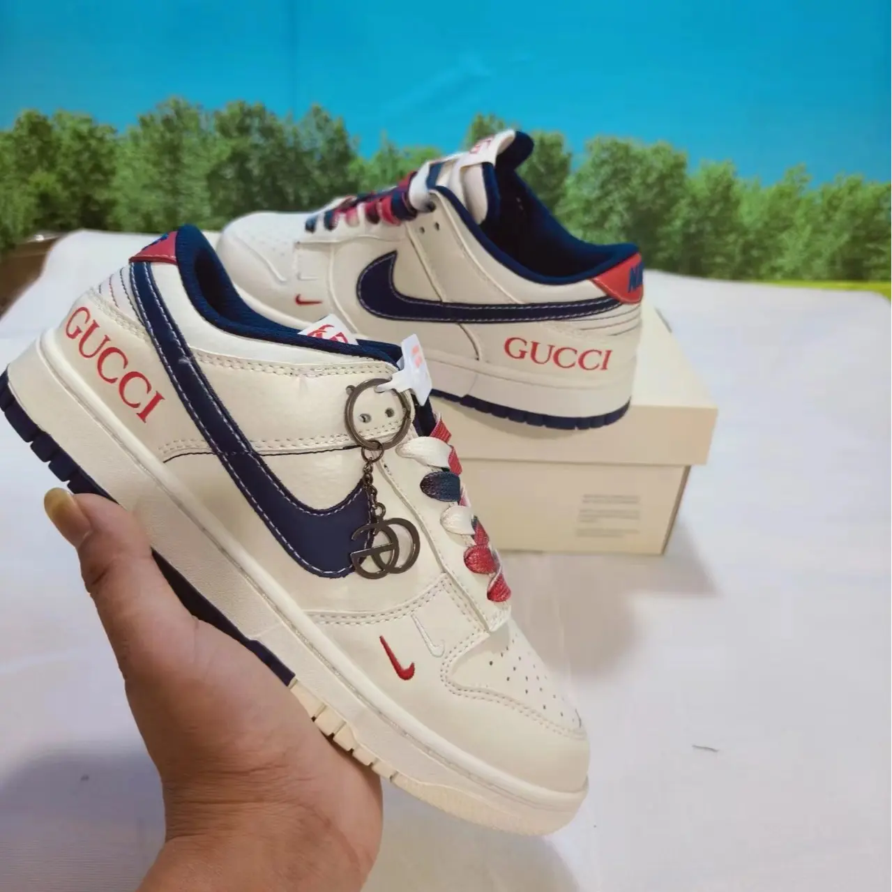 Streetwear kicks that elevate every crisp retro casual daily outfit, full sleek leather upper adopting cream navy scarlet tri-tone contrast design, perforated toe panels, grippy cream rubber outsole ideal for downtown commutes & denim street styling