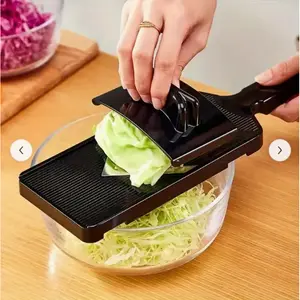 Premium Cabbage Shredding Tool, all-in-one vegetable slicer for chopping, slicing and shredding veggies. Ergonomic grip saves effort, makes food prep faster and easier. A must-have practical kitchen utensil for daily household use.