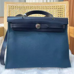 Pre-owned HERMÈS leather Shoulder Bags Herbag Zip 31 Blue Indigo Toile and Black Vache Hunter Shoulder Bag D7708