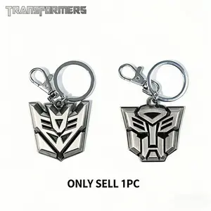 1PC TRANSFORMERS Officially Licensed Metal Keychain For Bags Bag Shirt Pants Jacket Versatile Decoration Cool Personality Style Keyring New Year Holiday Birthday Gifts For Family And Friends Keychain Pendant