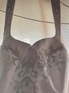 Wedding Dress with Embellished Design and Unknown Additional Features