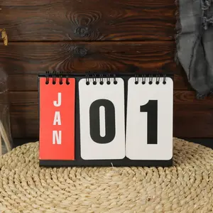 Versatile Flip-Date Calendar with Red Month Tabs & Large Number Display – Durable Spiral Bound Desktop Counterpiece, Ideal for Easy Date Adjustment, Clear Visibility, and Streamlining Your Daily Schedule at Work or Home
