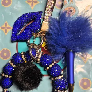Bundle Bags with Keychain Assortment Featuring Sparkling Red Lip Charm and Green Berry Beads for Stylish Accessory