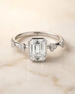 The Miley Bezel Solitaire Engagement Ring Setting for Emerald Cut Diamonds in Platinum