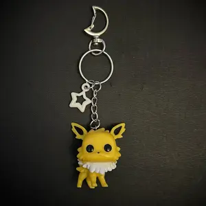 Jolteon Keychain with Clip - Cute Yellow Character Design for Bags and Keys