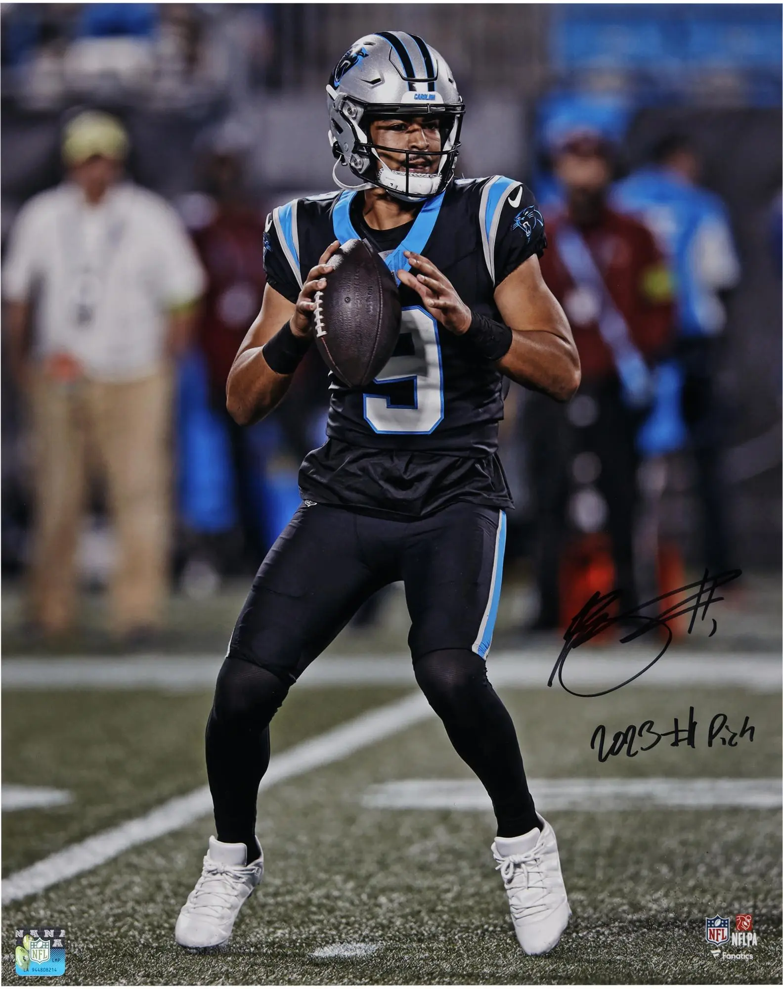 Bryce Young Carolina Panthers Autographed 16" x 20" Vertical Passing in Black Jersey Photograph with "2023 #1 Pick" Inscription - Fanatics Authentic Certified