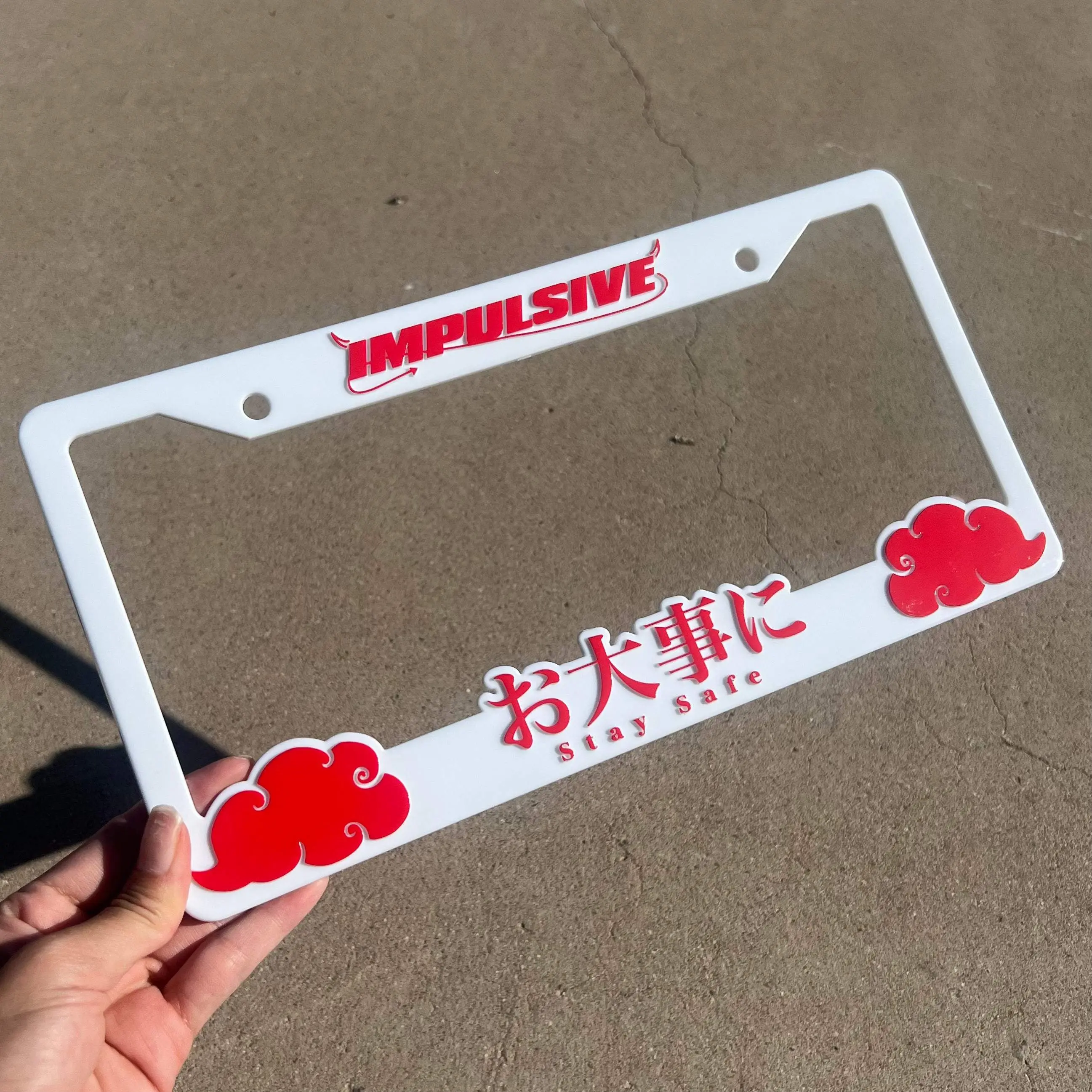 WHITE/RED Impulsive JDM Anime Stay Safe License Frames WHITE/RED Impulsive JDM Anime Stay Safe License Frames