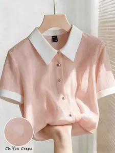 Elegant Pink Chiffon Blouse With White Collar, Loose Fit, Short Sleeves. Suitable For Summer, Carnival, And Holiday Occasions. Features Include Metal Button Embellishments, Versatile Style, Contrasting Collar, Loose Fit, Short Sleeves, And Pleated Fabric.