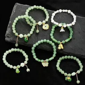 7PCS  Women's Green Jade Beaded Stretch Bracelet — A Chinese-Style Auspicious Gold-Plated Bangle and Traditional Healing Jade Accessory. The perfect lucky gift for her, suitable for both everyday wear and festive occasions.