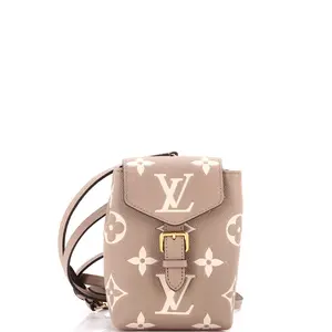 Pre-owned Louis Vuitton Leather Backpacks Tiny Backpack Bicolor Monogram Empreinte Giant by Rebag
