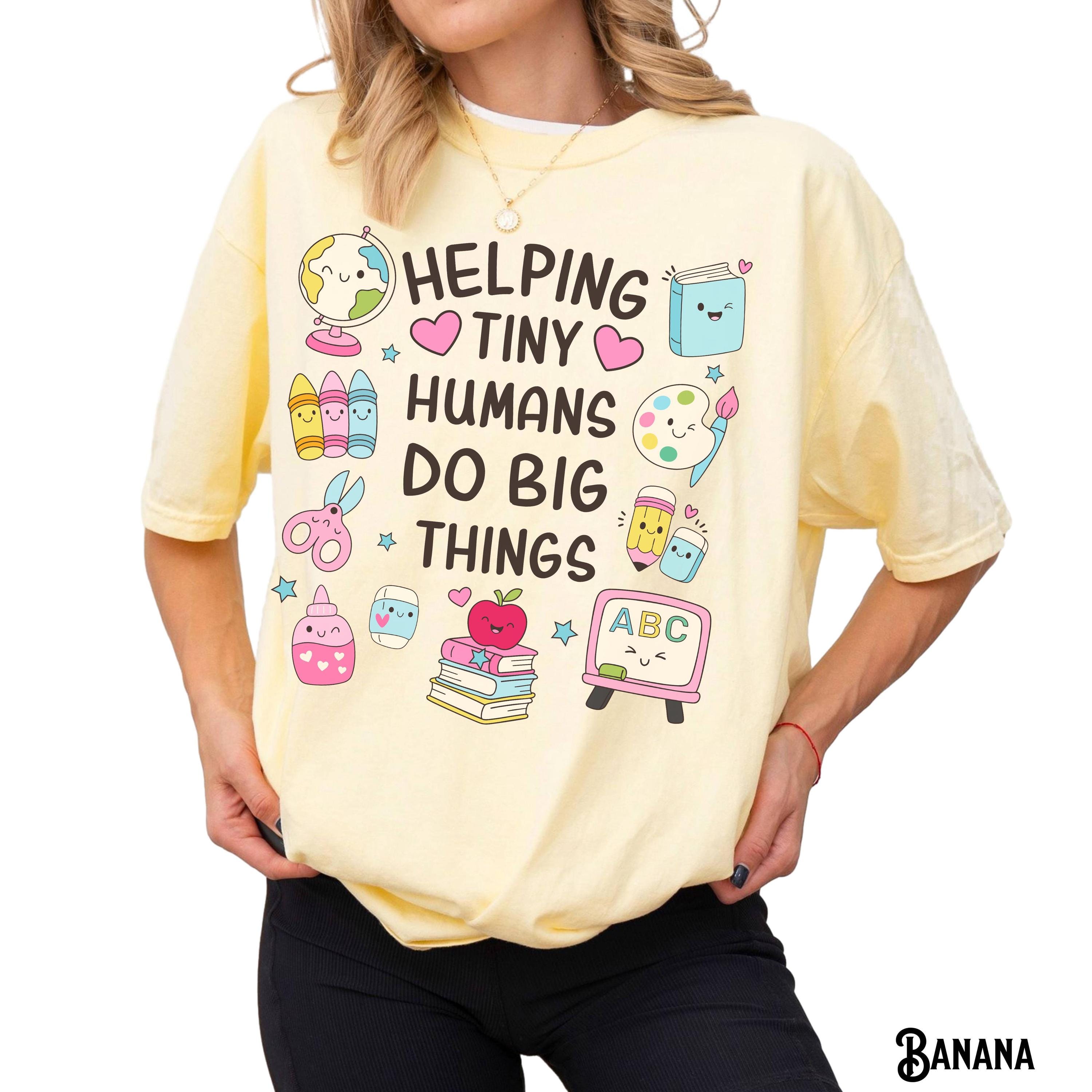 Women’s Short-Sleeve Loose Printed Graphic T-Shirt – Comfort Colors Unisex Garment-Dyed Everyday Tee for Preschool Teachers – Helping Tiny Humans Do Big Things, Early Education by TrendWear USA