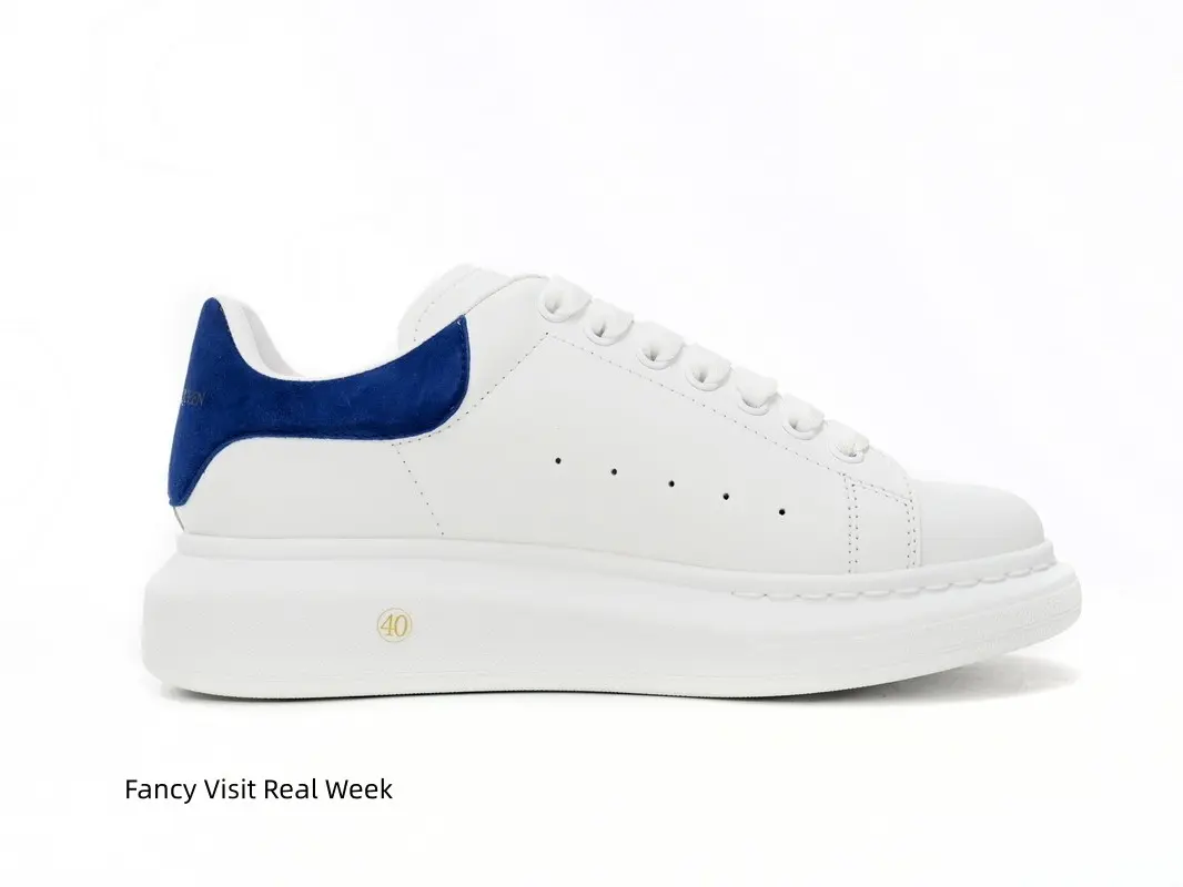 Elegant white platform sneakers with rich royal blue suede heel, match casual and formal outfits #ChunkySneakers #WhitePlatformShoes #ContrastCasualShoes