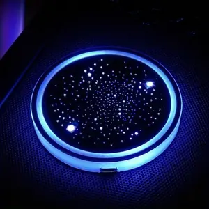 USB rechargeable illuminated cup mat, seven-color cup mat car ambient light, USB rechargeable round ambient light, cup holder light with seven-color changing charging vibration start light, suitable for beautifying interior scenes.