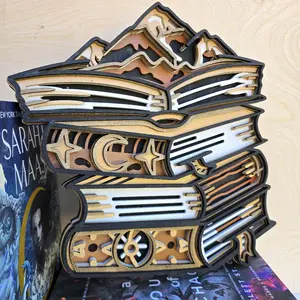 Wood Layered Book Stack Wall Art with Intricate Mountain and Star Designs for Home Decor