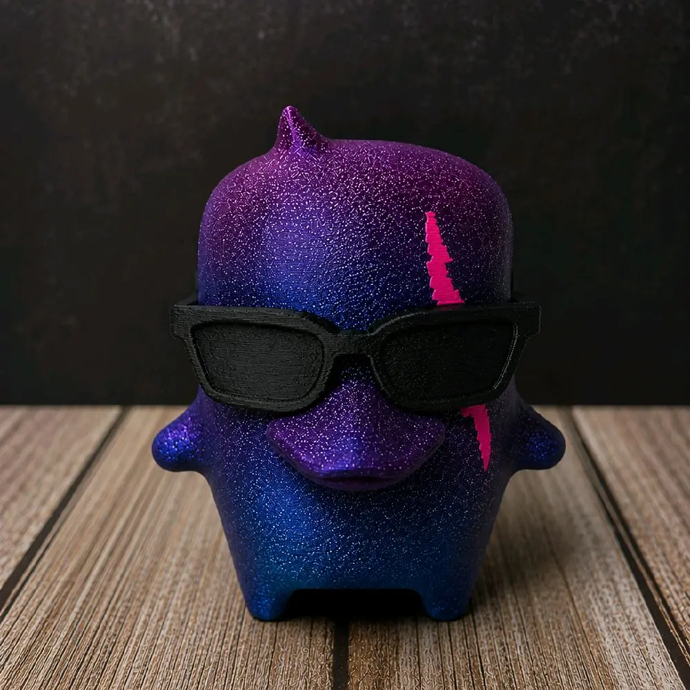 Galaxy Duck 5 inches, with removable glasses.5 Inches Duck Sprite with Removable Glasses  Fun Design for All Ages: This 5-inch Duck sprite is a delightful addition to any collection. Perfect for kids and adults, it features a yellow color that stands out.