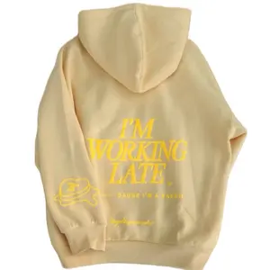 Butter Yellow Hoodie - "I'M WORKING LATE" Graphic Design with melted butter Illustration, Classic Style for Casual Wear Sweatshirts