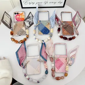 Geometric pattern PU leather phone case with a silk scarf bracelet. The hard PC back plate protects the phone case, suitable for Motorola Razr 2024, Razr 2025, Razr 50, Razr 60, Razr 50 Ultra, Razr 60 Ultra