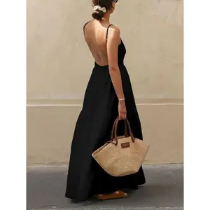 Women's black backless long dress with thin shoulder straps, sleeveless summer beach dress, elegant and graceful, pretending simple and chic, bohemian styleRAIMENTRY