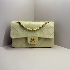 Pre-owned CHANEL Vintage Medium Classic Flap Bag in Quilted Lambskin Leather, Pale Yellow with Gold Hardware ( Circa 1991 1994)A060 HK