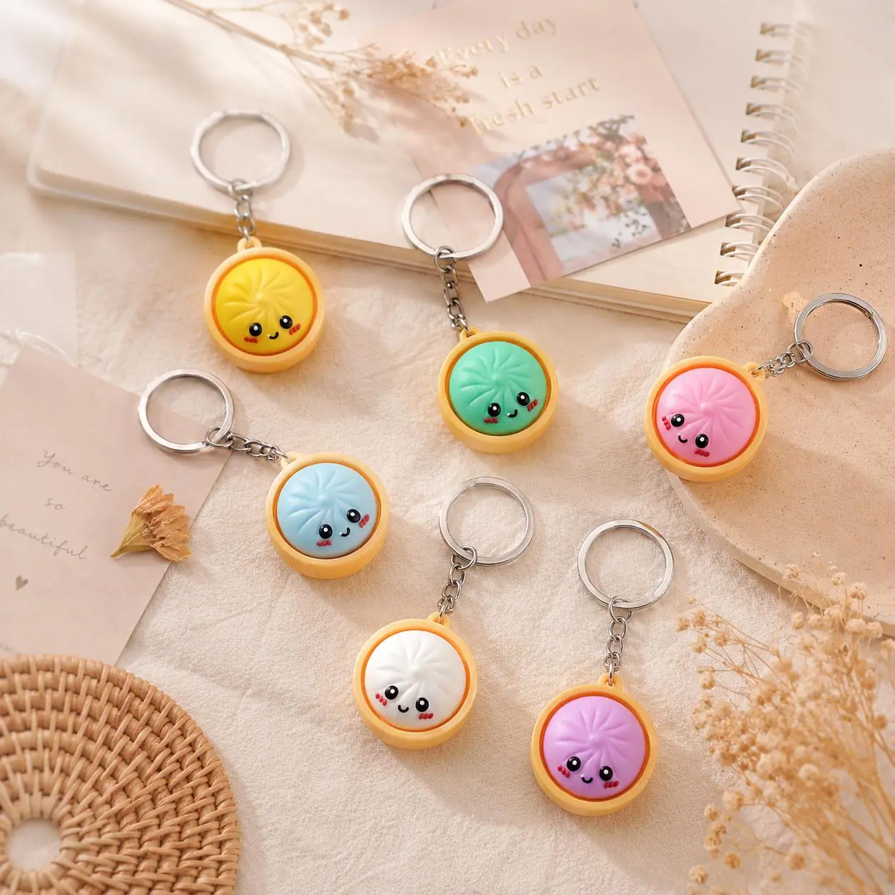 6Pcs Cute Mini Dumpling Keychains – Realistic food-themed cartoon charms and accessories; ideal for backpack and handbag zippers, kids' birthday party favors, and holiday gifts.