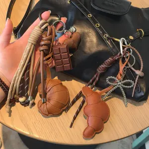 Croissant-Style Leather Bag Charm, Miu-Inspired Chocolate-Themed Ins Style Keychain, Double-Sided Stitching Bag Accessory for Sports & Outdoor Use, Sports Wristbands Complementary Accessory, Bag Charms