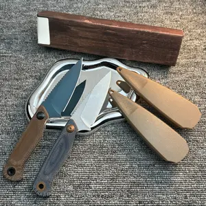 The 203 EDC Fixed-Blade Knife features a compact design and a textured, non-slip handle, blending a stylish aesthetic with practical outdoor functionality.
