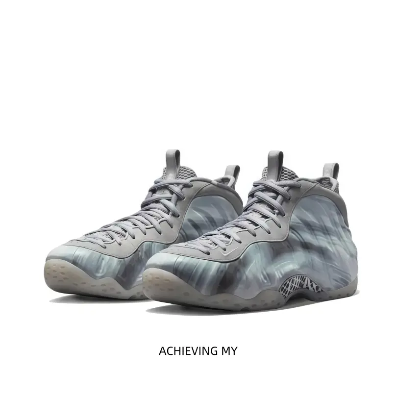 Grey gradient brushed foamposite mid top basketball sneakers blurred streaky print upper light gray lace collar translucent icy outsole minimalist street unisex performance trainers