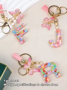 26 letter optional fashionable and cute butterfly glitter letter pendant/keychain, suitable for daily wear, vacation and dating occasions, and also a surprising and exquisite small gift.