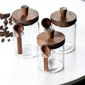 3-piece set of glass jars with spiked locust wood screw lids and spoons, 15oz, 18.5oz and 25oz capacities. Ideal for bulk coffee beans or tea leaves, also suitable as countertop salt and sugar containers, or as yoghurt pots for overnight oats.