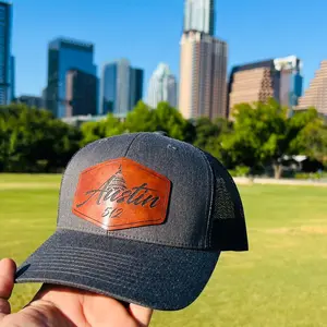 Austin TX Leather Patch Hat on a Yupoong 6606 Classic SnapBack Hat