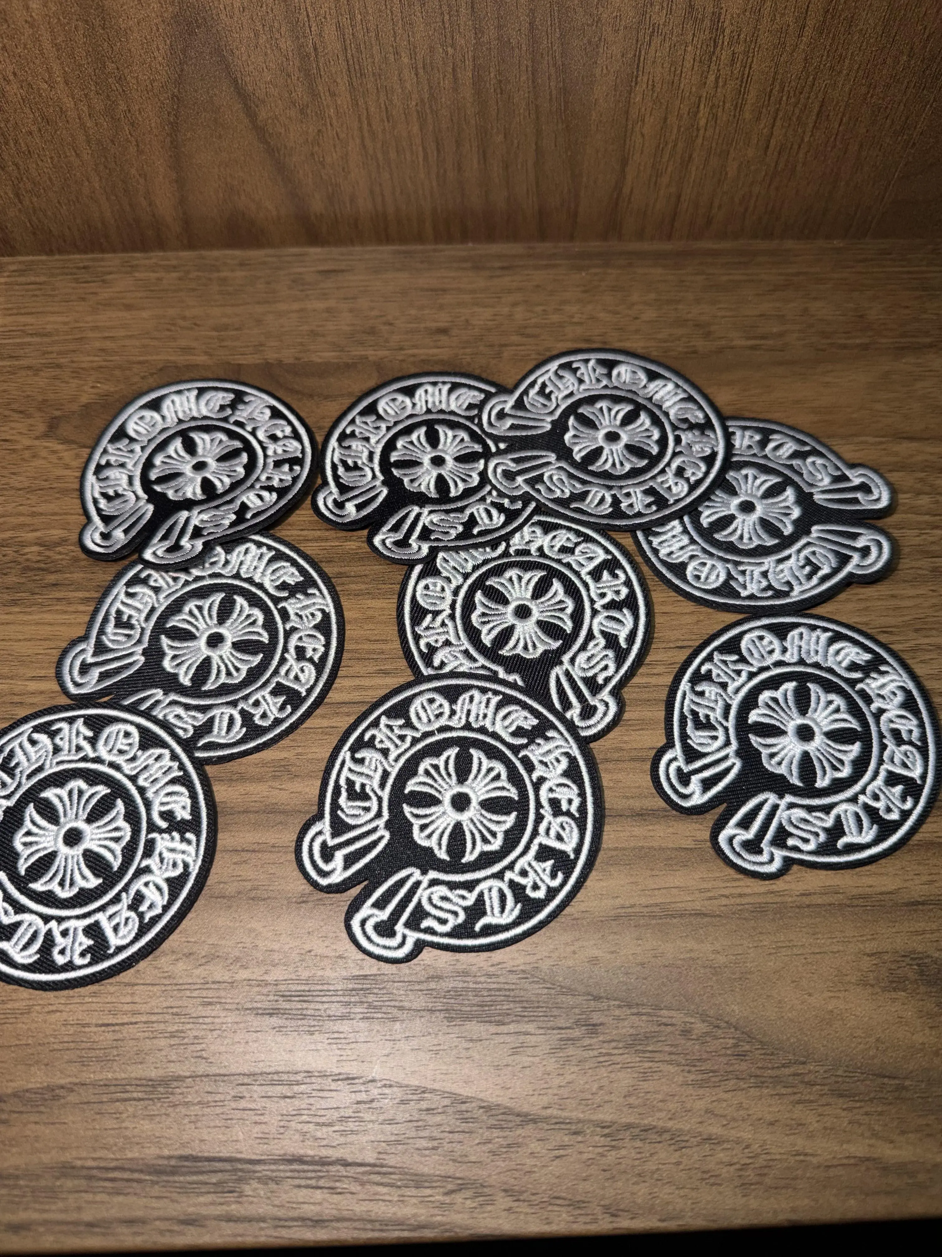 Black embroidered patch with white words for DIY crafts, iron-on, clothing