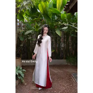 Ivory/ red Modern Loosing ao dai with teardrop cut out buttons| Candy tuft