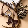 Christmas & Thanksgiving Gift, Bow Earphone Charm PU Leather Keychain, Cute Mini Bag Pendant with Heart Lobster Clasp, Aesthetic Bag Backpack Wallet Accessory, Trendy Earbud Hanging Ornament, Unisex Couple & Friend Decor Trinket