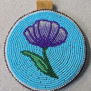 Handmade Purple Flower Medallion with Beaded Wrap Around Rope Chain and Vibrant Beadwork.