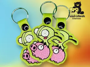 Green Robot on Pig Embroidered Vinyl Keychain