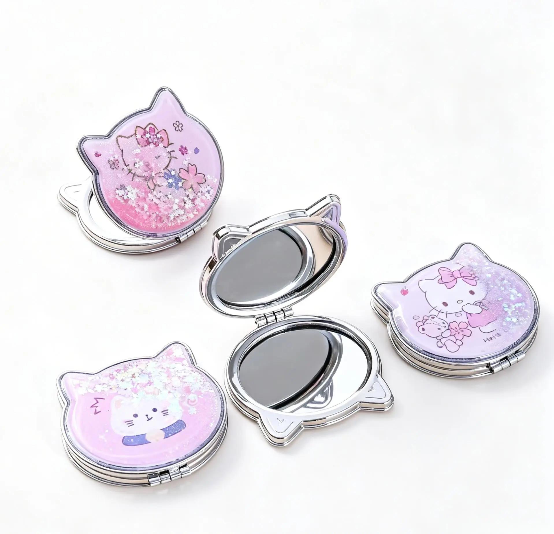 Sanrio Hello Kitty Compact Mirror Flip-Top Portable Double-Sided Hand Held, Glitter Quicksand Flowing Sand for Travel Daily Touch-Up, Gift for Girls & Teens.