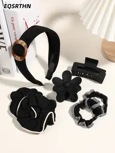 7pcs black hair band hair grip set. Contains large flower square hairpin, black white-rimmed large intestine hairband, round suede wide-rimmed black hairband, plaid lace hairband. Black Department of elegant atmosphere