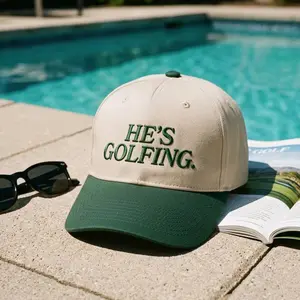 He Is Golfing Embroidered Trucker Hat, Golf Season Baseball Cap, Funny Golfer Gift, Mesh Back Adjustable Hat, Trending Golf Lover Apparel