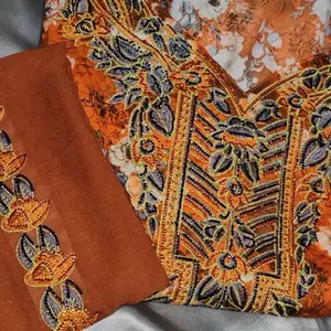 Orange floral mukhawar with matching hijab