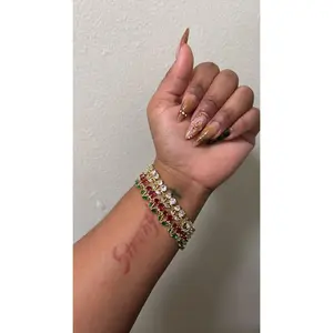 Ruby Blossom Bracelet with Elegant Red and Green Gemstones and Delicate Floral Design for Women