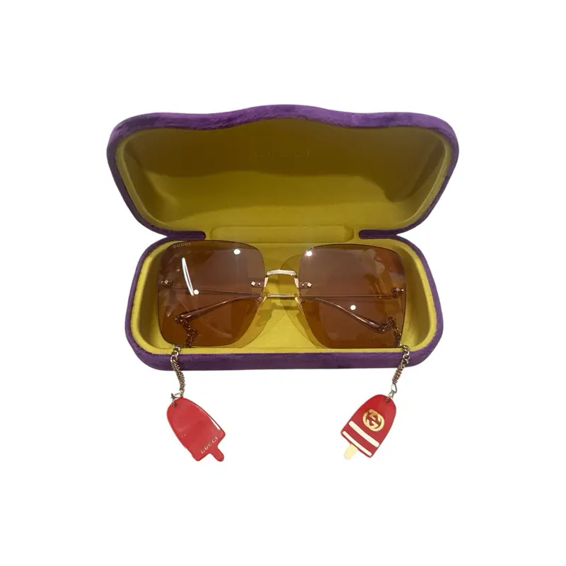 Pre-owned GUCCI metal Bag Accessories GG1147S Rimless Square Sunglasses , Orange Lenses, and Detachable Red Popsicle Charms.