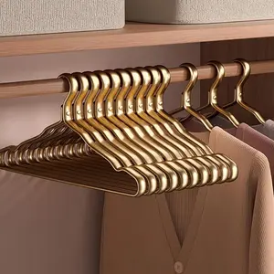 10pcs Elegant Golden Lacquered Metal Hangers, Non-Slip & Traceless, Sturdy & Durable, Ideal for Home and Retail Organization of Various Garments Organiser Hanging