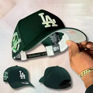 Los Angeles Dodgers New Era 9FORTY Snapback Baseball Cap – Dark Green Flat Brim Hat with White LA Logo & Anniversary Side Patch, MLB Streetwear Headwear
