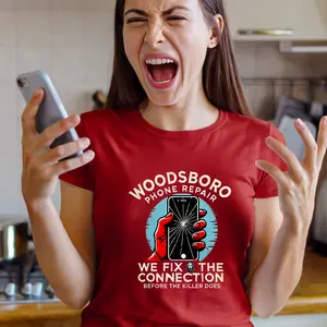 🎬🔧 Fix your style with our Woodsboro Phone Repair T-Shirt! This cracked screen horror design is a must-have for scary movie fans! 👻📱 Grab yours and celebrate your love for classic horror! #ScaryMovie #GraphicTee #WoodsboroVibes
