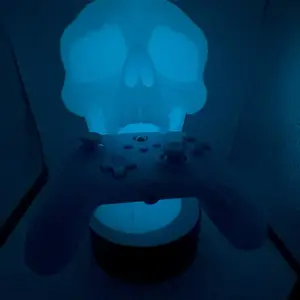 Skull game control holder  and headphones